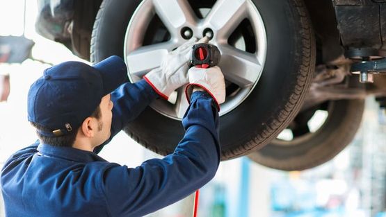 One of our proficient team undertaking a car repair. 